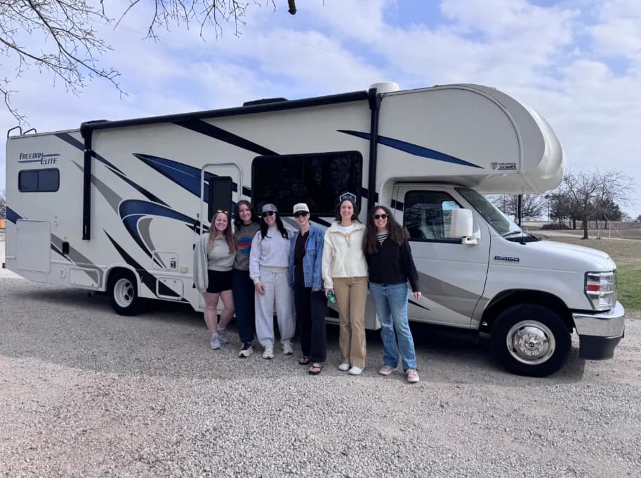 The Suite Glamping Adventures team with one of their rigs